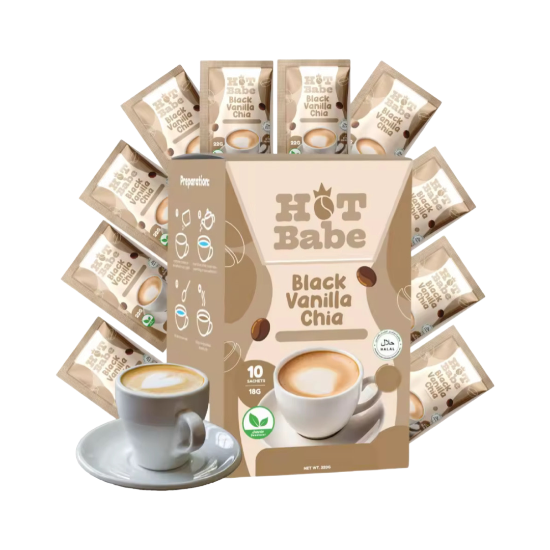 Vanilla Coffee with heart shape whipped cream on top, in a cup with saucer, box of coffee with 10 sachets behind it